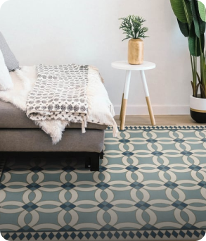 A man in a hoodie and cap walking away